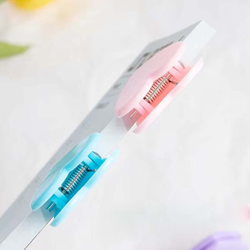 Transparenter Acrylclip mit Herzbindung