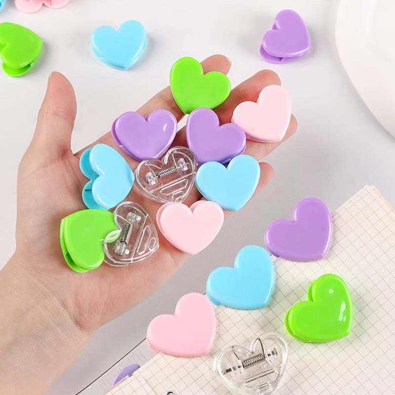 Transparenter Acrylclip mit Herzbindung